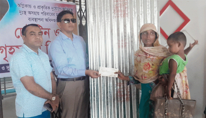 লালপুরে ডেউটিন বিতরণ