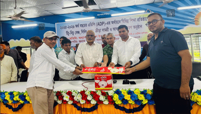পুঠিয়ায় এডিপি প্রকল্পের আওতায় স্কুল-কলেজে শিক্ষা উপকরণ বিতরণ