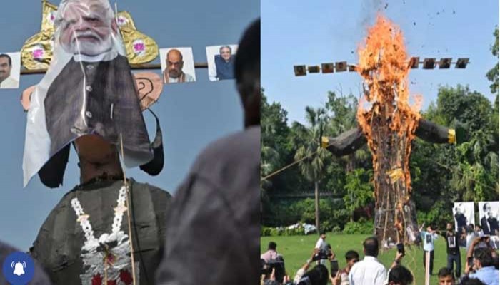 রাবণের মুখে মোদি-ট্রাম্প-দোভাল-আম্বানির ছবি লাগিয়ে কুশপুত্তলিকা দাহ